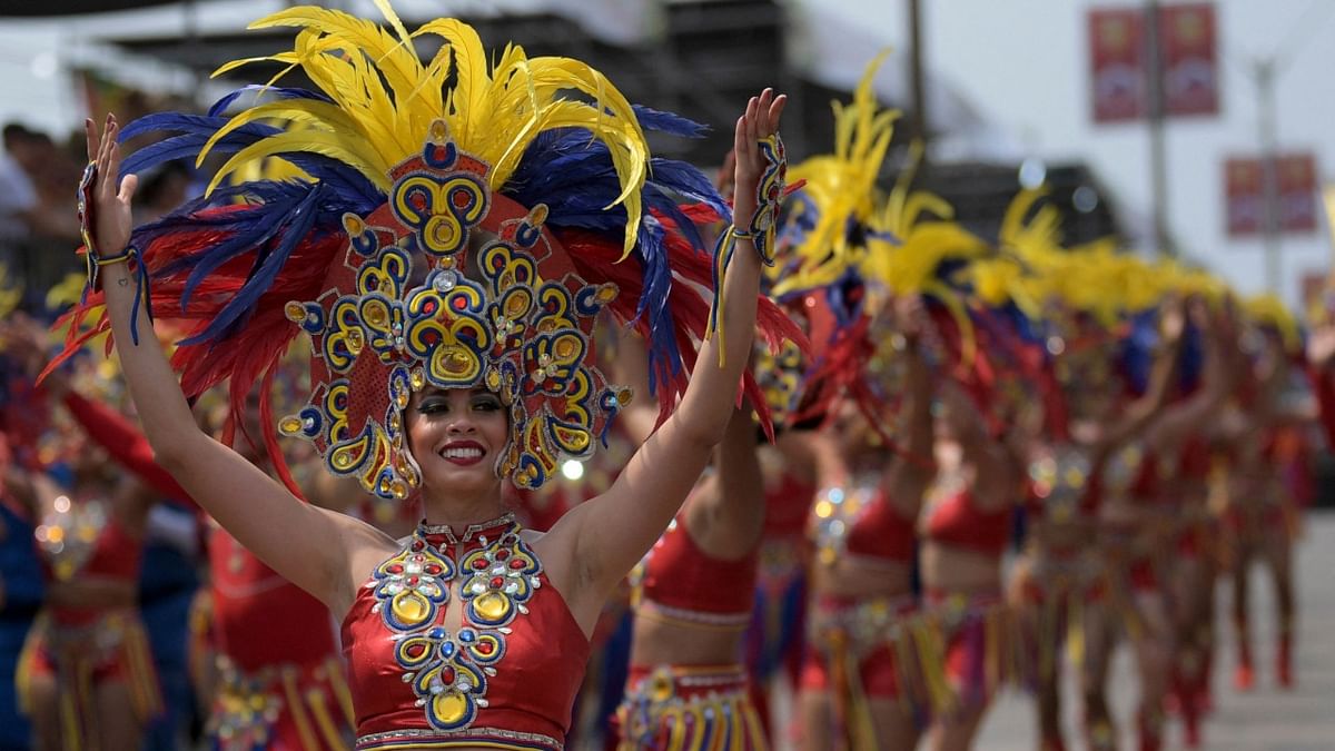 Revelers perform in the Battle of Flowers parade as part of Barranquilla's Carnival in Colombia. Credit: AFP Photo