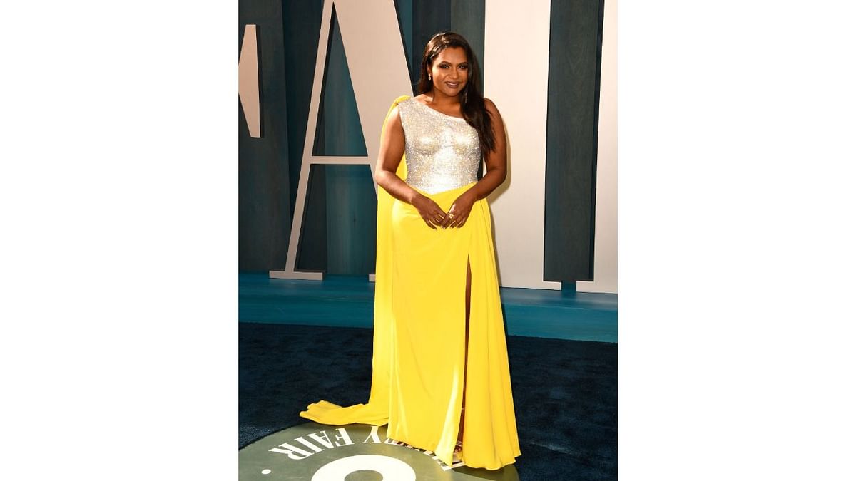 Mindy Kaling arrived donning a vibrant Dolce & Gabbana dress. Credit: AFP Photo