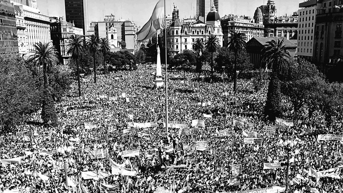 Photo released by Telam of people gathering at the Plaza de Mayo square in Buenos Aires on April 2, 1982, to acclaim Argentine dictator Leopoldo Galtieri after Argentine forces invaded the Falkland Islands. Credit: AFP Photo