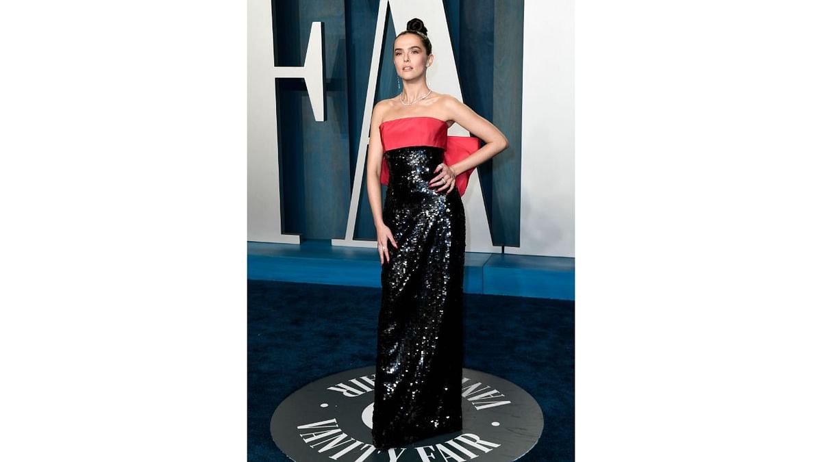 Zoey Deutch arrived in a sequin Carolina Herrera gown which had a mesmerizing effect on all. Credit: AFP Photo