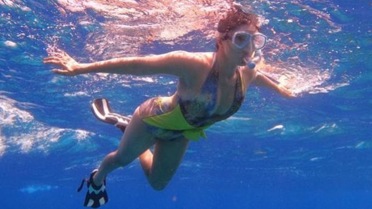 Actress Sunny Leone is seen enjoying snorkelling inside the sea. Credit: Instagram/sunnyleone