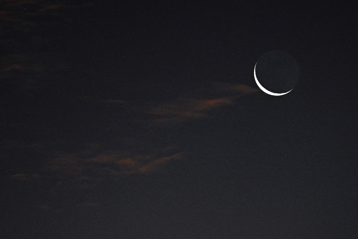 A general view shows the crescent moon during sunrise in Banda Aceh, Indonesia. Credit: AFP Photo
