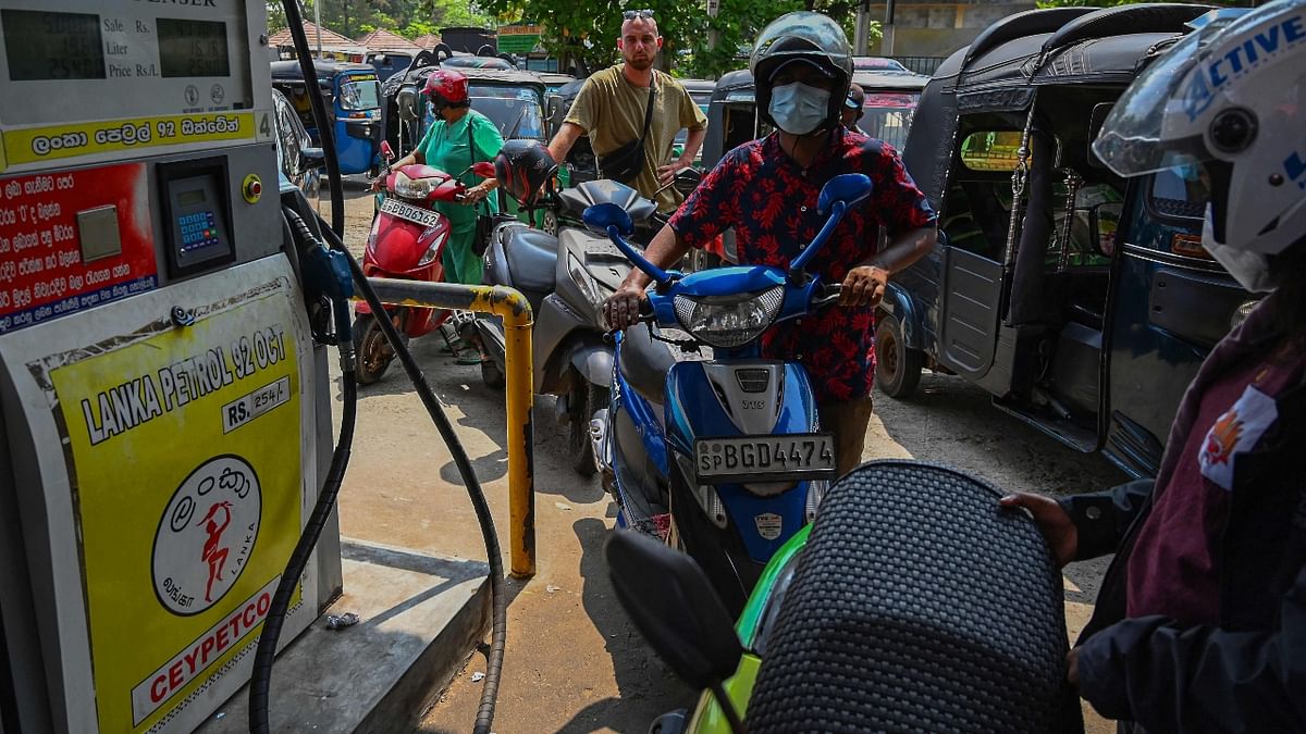 The CPC told motorists waiting in long queues at petrol stations to leave and return only after imported diesel is unloaded and distributed. Credit: AFP Photo