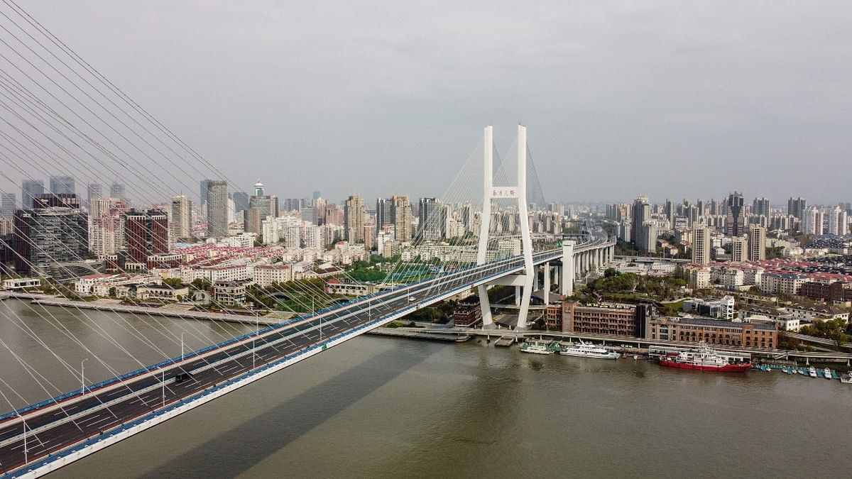 Shanghai is being locked down by splitting the city into two, roughly along the Huangpu River, dividing the historic centre west of the river from the eastern financial and industrial district of Pudong. Authorities say this allows for staggered mass testing. Credit: AFP Photo
