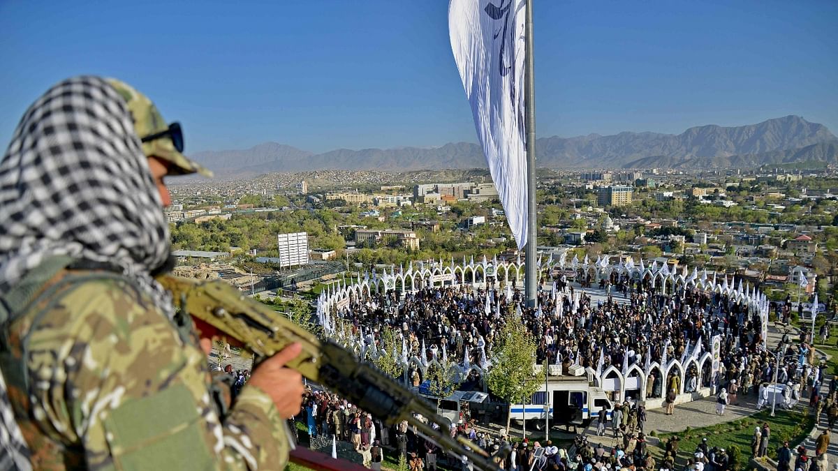 The flag-raising comes a week after the Taliban shut down all girls' secondary schools just hours after they allowed them to reopen for the first time since August. Credit: AFP Photo