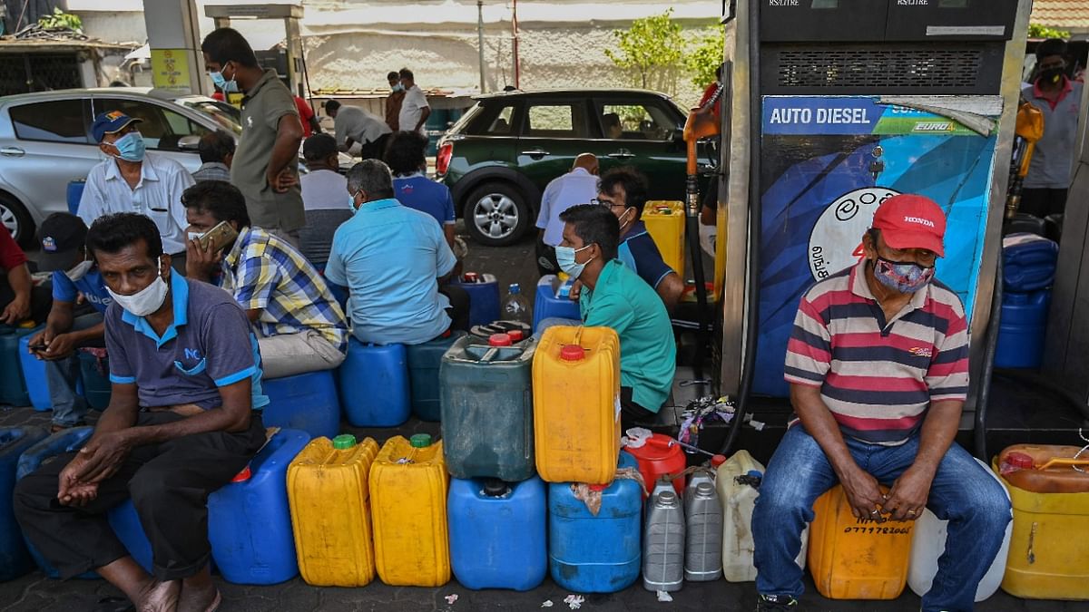 Sri Lankans are also dealing with shortages and soaring inflation, after the country steeply devalued its currency last month ahead of talks with the International Monetary Fund for a loan programme. Credit: AFP Photo