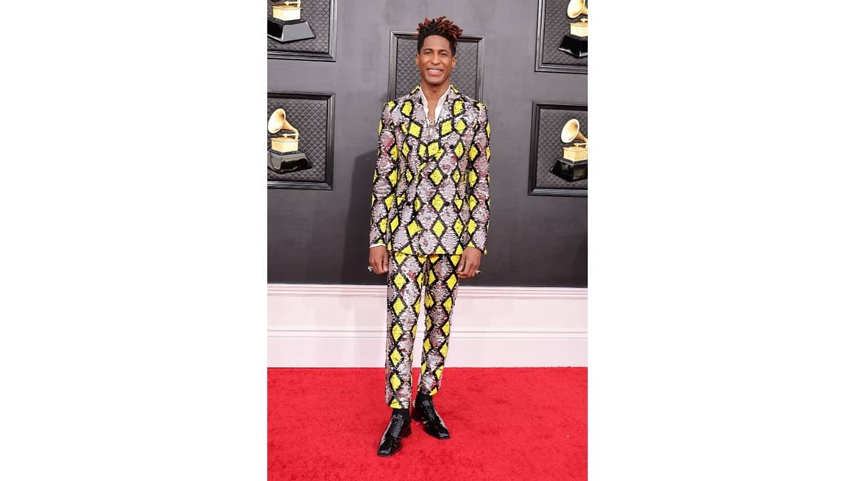 Jon Batiste was a stunner in a shiny suit with yellow checks. Credit: AFP Photo