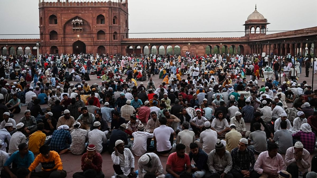 Muslim devotees break their fast at the Jama Masjid Mosque on the first day of the holy fasting month of Ramadan in Delhi. Credit: AFP Photo