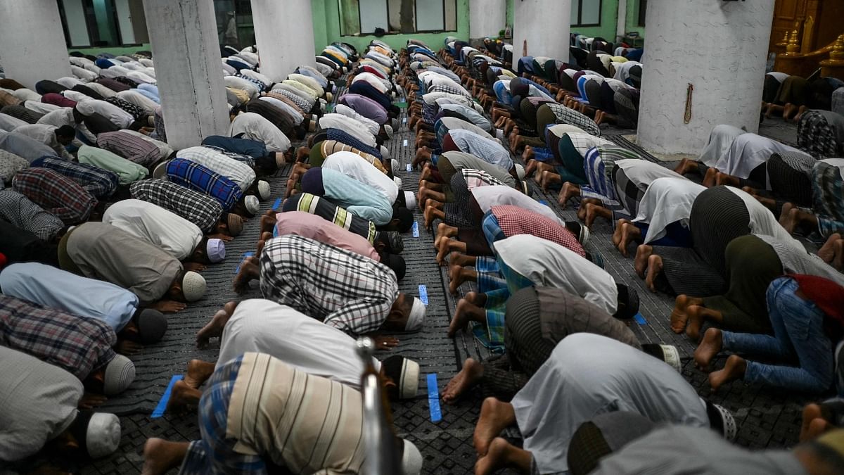 Muslim devotees offer prayers at the Nwe Aye Mosque on the first day of the holy fasting month of Ramadan in Yangon. Credit: AFP Photo