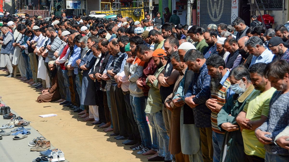 Muslim devotees in Kashmir offer namaz, on the second day of the holy month of Ramadan, in Srinagar. Credit: PTI Photo