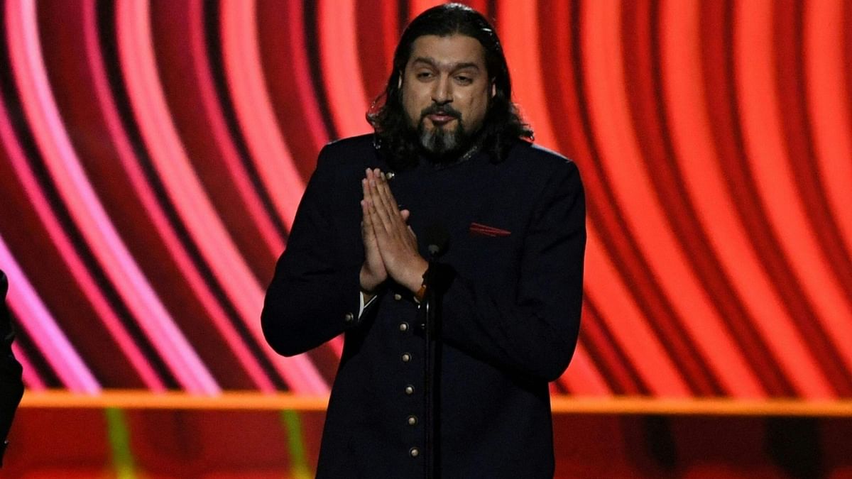 Kej greeted the audience with a namaste when he took the stage with Copeland to receive the prestigious gramophone. Credit: AFP Photo
