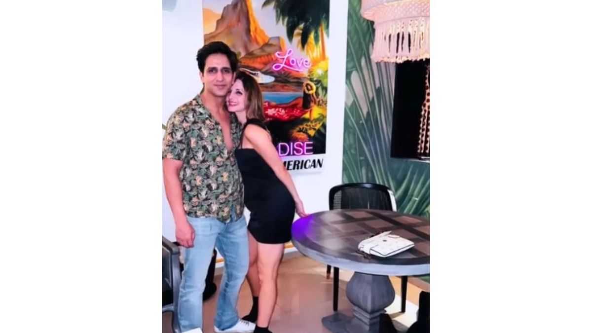 Arslan and Sussanne Khan pose together for a photo during restaurant Vedro launch party in Goa. Credit: Instagram/suzkr