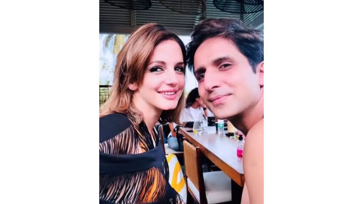 Sussanne Khan poses with Arslan at Vedro launch party in Goa. Credit: Instagram/suzkr