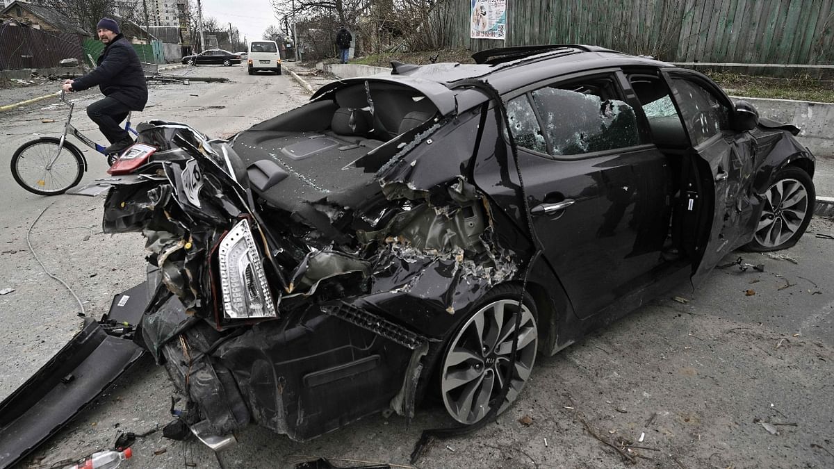 A destroyed car is seen on the streets of Bucha, Ukraine. Credit: AFP Photo