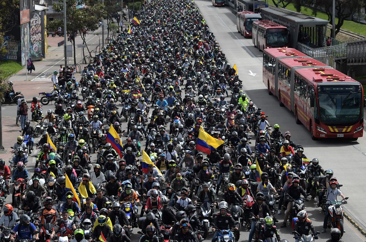 Thousands of motorcyclists take part in a protest against restrictions on their mobility imposed by the local government in order to fight insecurity in Bogota. Credit: AFP Photo