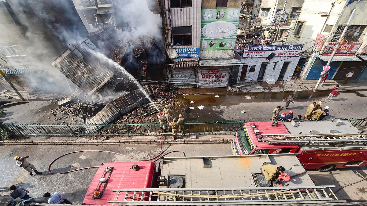 Disaster management teams were deployed and earthmoving machines were called to remove the debris from the collapsed building. Credit: PTI Photo