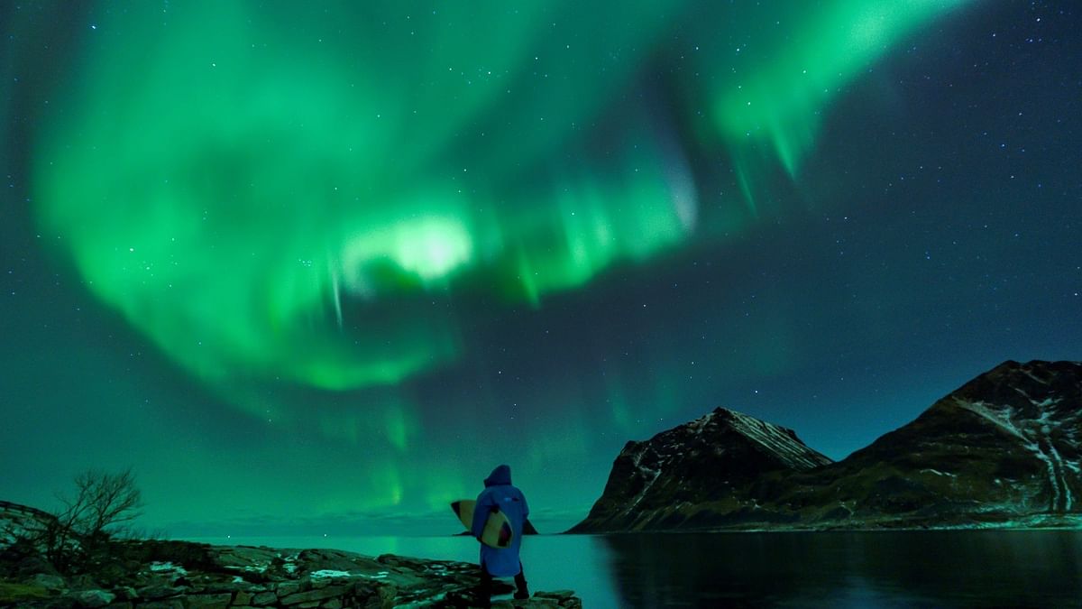 The northern lights can also be spotted dancing above High Falls, the tallest waterfall in Minnesota, US. Credit: AFP Photo