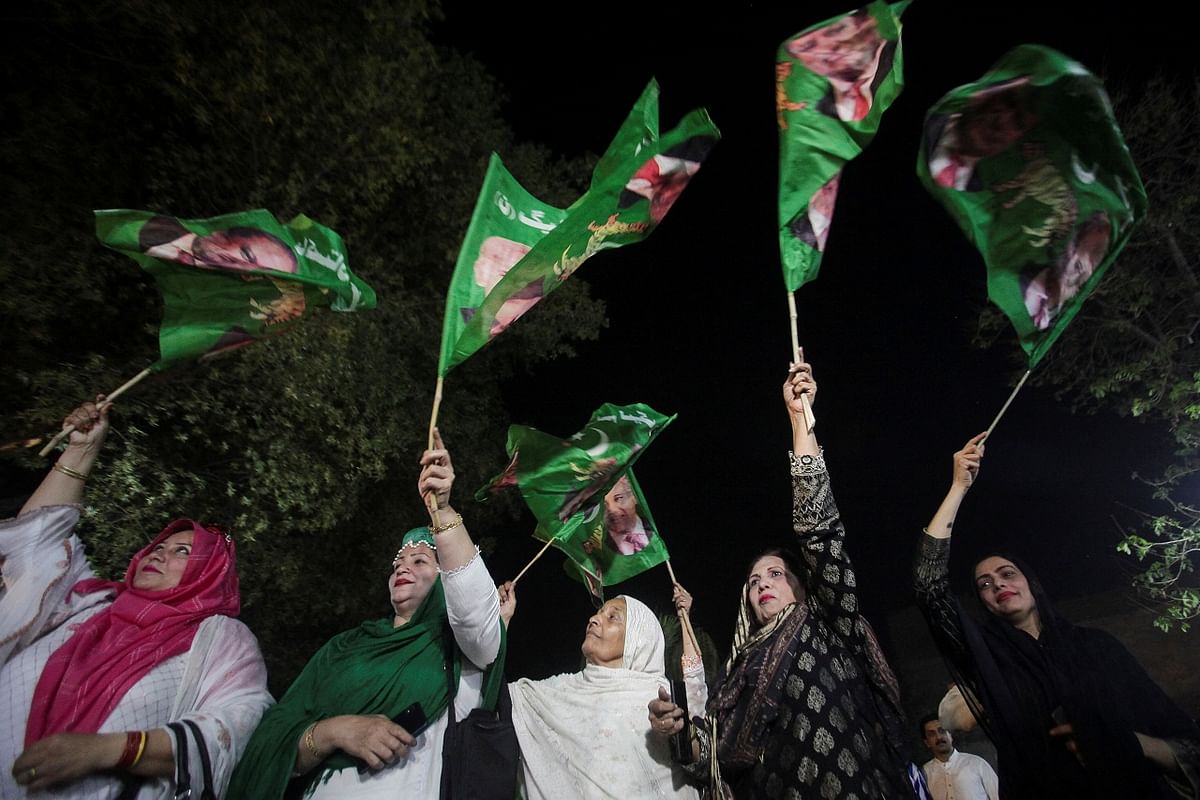 People celebrate after Shehbaz Sharif was sworn in as the country's prime minister, in Lahore. Credit: Reuters Photo
