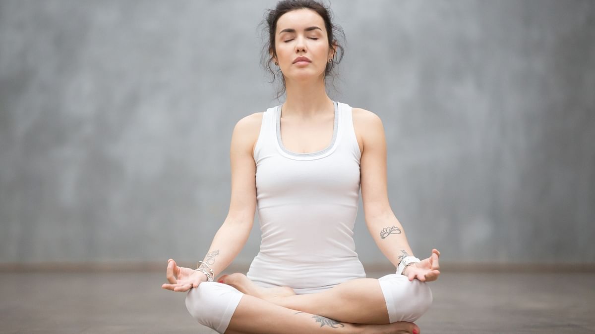 This pose is extremely helpful in improving breathing, relieving tension, and enhancing blood circulation. Credit: Getty Images