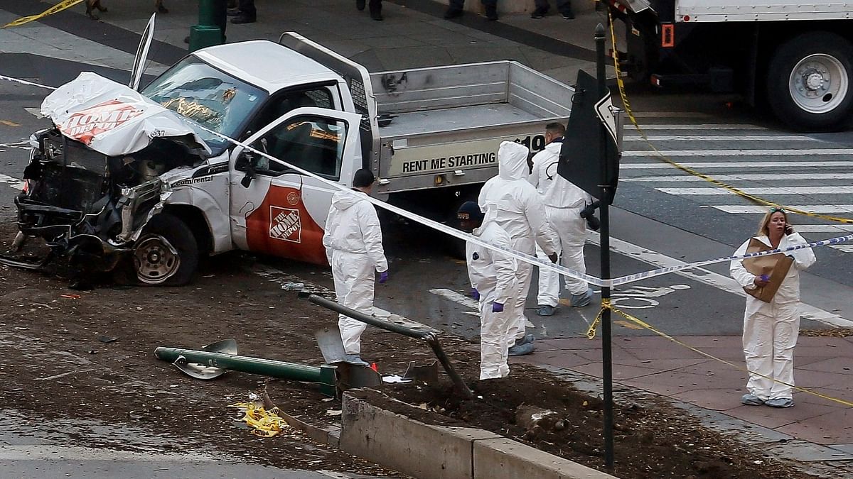 2017 Bike Path Killings: In 2017, a New Jersey man allegedly drove a truck on Halloween down a bicycle path along the Hudson River in Manhattan, killing eight people and injuring numerous others. The truck driver, Sayfullo Saipov, was shot and wounded by police after he reportedly smashed into a school bus and then ran down the highway with a paintball gun while shouting “Allahu akbar.” He was charged with terrorism and the murder of eight civilians. Credit: AP Photo