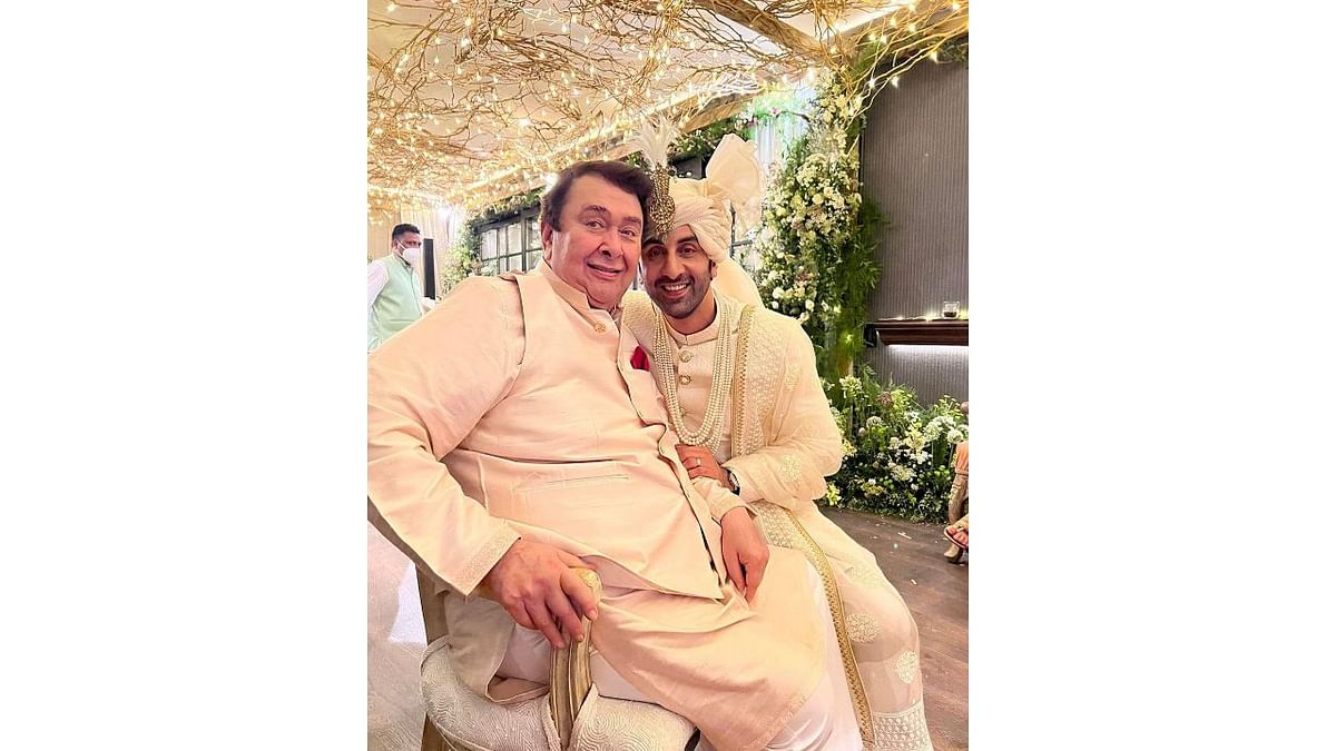 Ranbir with his uncle Randhi Kapoor at his wedding. Credit: Instagram/@therealkarismakapoor