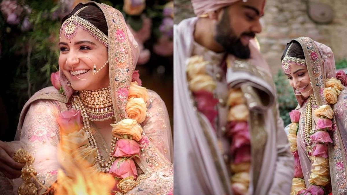 Anushka Sharma, who started the trend of pink pastel bridal lehengas, opted for Sabyasachi’s creation for her wedding ceremony and it had flower motifs throughout. Credit: Instagram/virat.kohli
