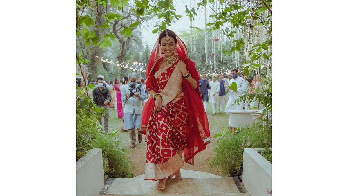 Dia Mirza introduced the sustainable style to the forefront carrying a crimson Benarasi saree by Uncooked Mango paired with an easy crimson dupatta draped over her head. Credit: Instagram/diamirzaofficial