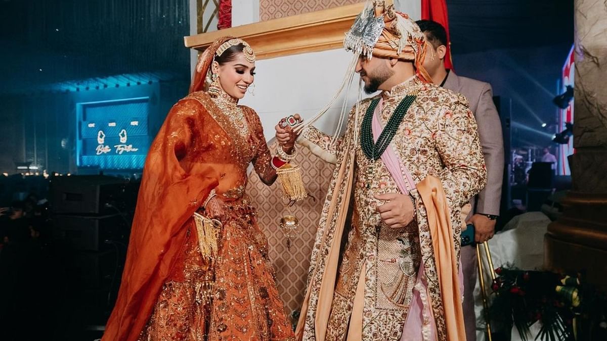 Millind was seen donning a golden sherwani while Pria looked stunning in a heavily embroidered lehenga. Credit: Dipak Studios