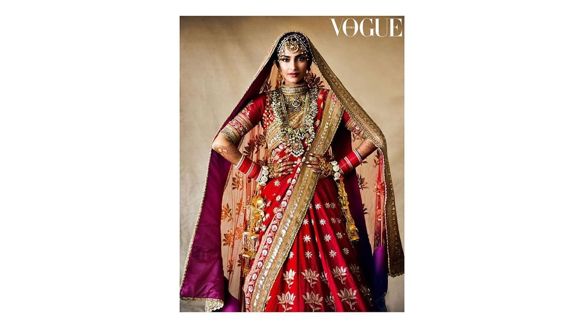 Bollywood fashionista Sonam Kapoor looked ethereal in a crimson and gold Anuradha Vakil lehenga and heavy ethnic jewellery. Credit: Instagram/sonamkapoor