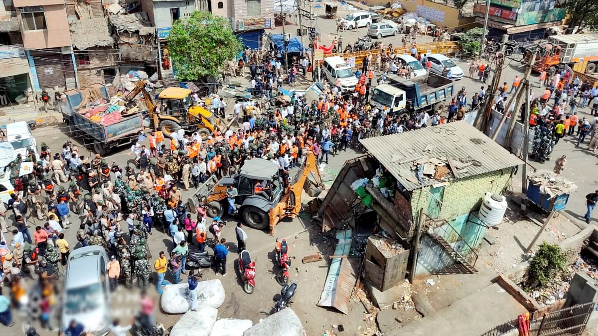 After Uttar Pradesh and Madhya Pradesh, bulldozers were deployed in the capital to raze illegal constructions. A demolition drive was carried out by the municipal corporation against the alleged encroachers in Delhi's Jahangirpuri area, where communal clashes broke out on Hanuman Jayanti. Credit: PTI Photo