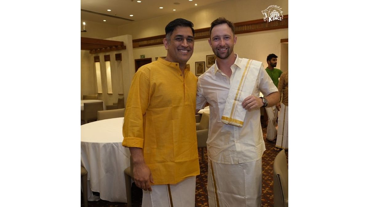 Dressed in dhoti kurta, MS Dhoni is seen posing with  Devon Conway during his pre-wedding party. Credit: CSK