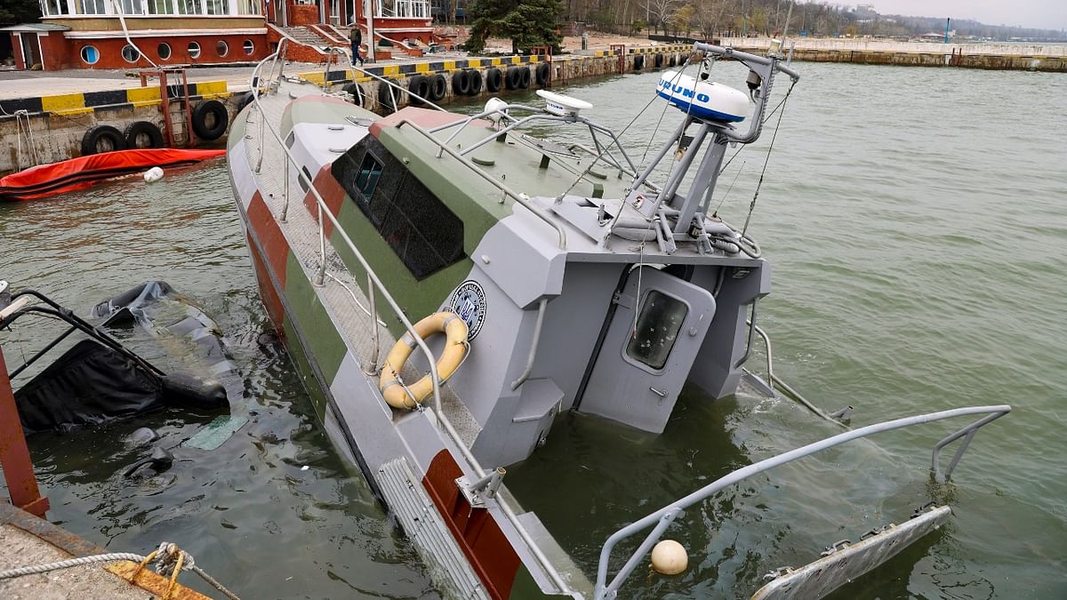 A damaged boat of the Ukrainian Coast Guard of the Sea of Azov is seen after a heavy fighting in an area controlled by Russian-backed separatist forces in Mariupol, Ukraine. Credit: AP Photo