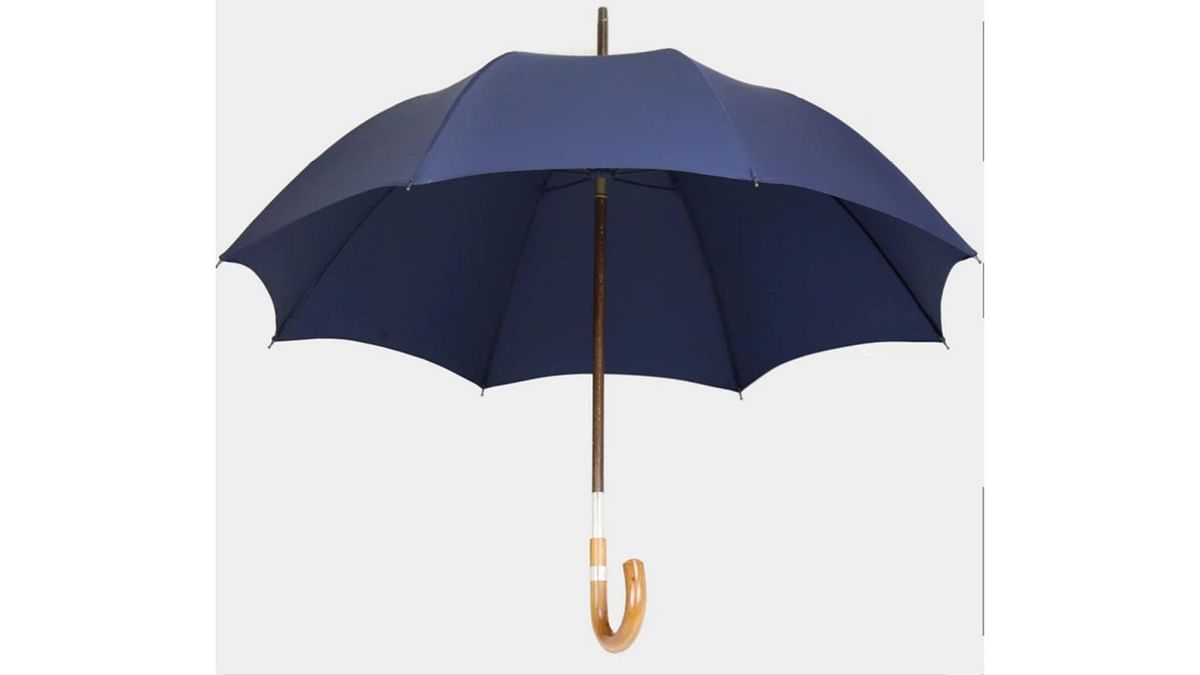 Detachable: The Malacca Traveller umbrella from the Charles Brigg range has a removable handle and end piece, making it easy to carry around. The handle, in stained beech wood shaft, has a plated gold or sterling silver collar, nylon or hand woven silk canopy. Priced at Rs 49,238, the collar can be engraved for an additional cost. It is available in three sizes — 25, 26 or 27 inches. Credit: swaineadeneybrigg.com