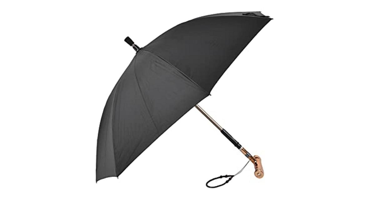 Smart shade: This umbrella from Haowecib is equipped with a LED light system which can be adjusted from 45 degrees, based on different road conditions. It also has an alarm that can alert passing vehicles when the person carrying it is on the roads at night. It comes with a gold- or silver-coloured handle and is priced at Rs 24,889. Credit: Amazon.in