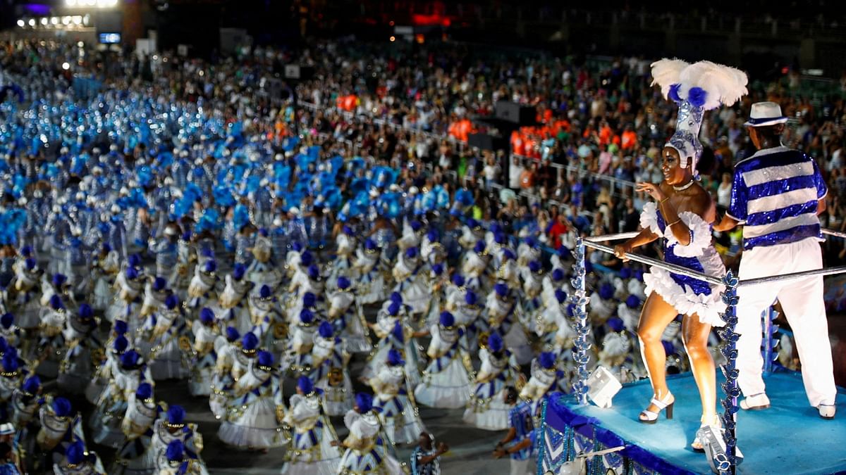 Colourful floats and flamboyant dancers gave a scintillating performance delighting tens of thousands by filling up the streets of Rio de Janeiro's iconic Sambadrome, putting on a delayed Carnival celebration after the pandemic halted the dazzling displays. Credit: Reuters Photo