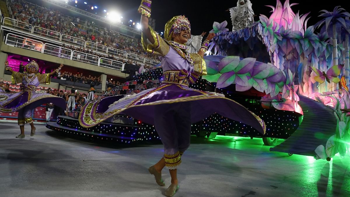 Revellers from Paraiso do Tuiuti samba school perform during the second night of the Carnival parade at the Sambadrome in Rio de Janeiro, Brazil. Credit: Reuters Photo