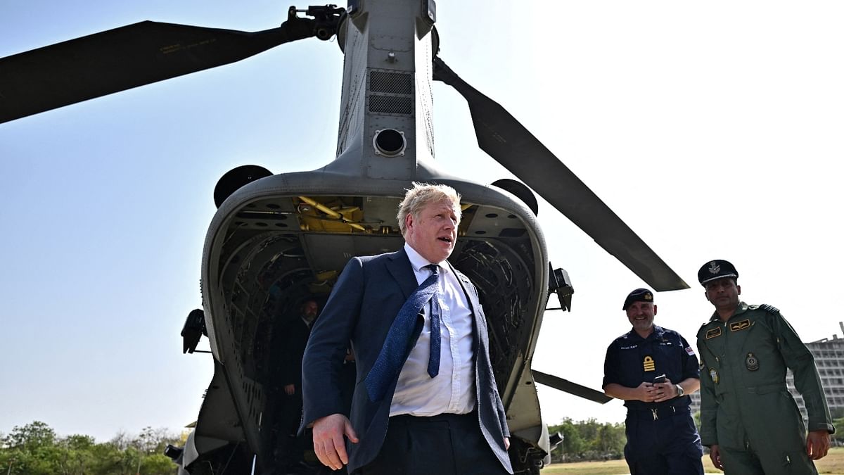 In this photo, Johnson can be seen disembarking from an Indian military's Chinook helicopter upon his arrival in Gandhinagar. Credit: Reuters Photo