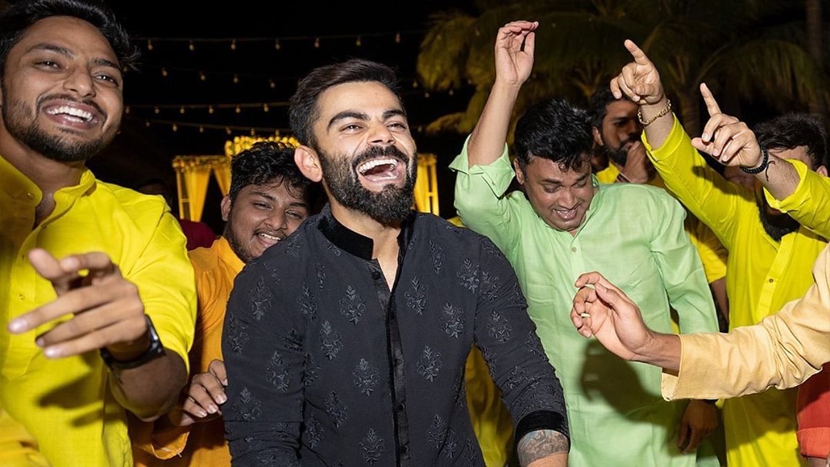 Virat Kohli grooves to some foot tapping numbers at the party. Credit: RCB