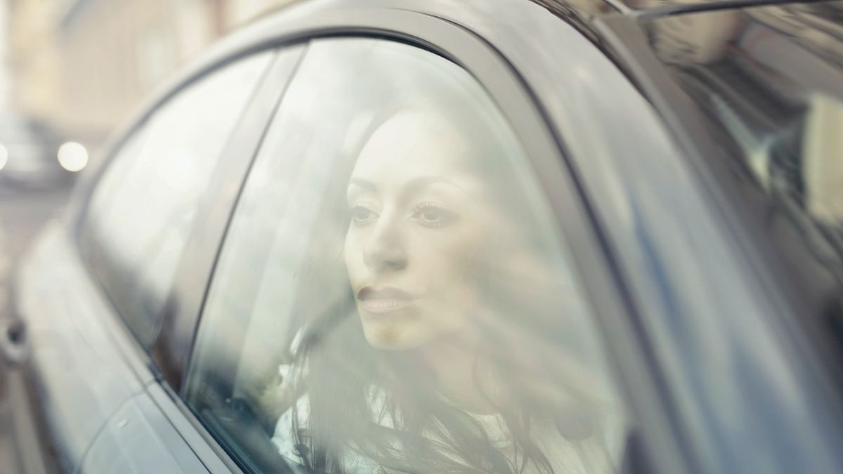 Roll down the window a little bit while parking the car as this allow the outside air into the car and saves the interiors from overheating. Credit: Pexels/Andrea Piacquadio