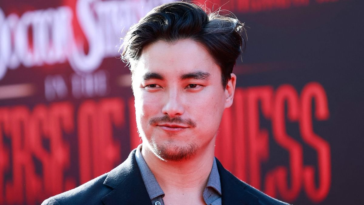 Australian actor Remy Hii poses for the camera as he arrives for the Los Angeles premiere of 'Doctor Strange in the Multiverse of Madness.' Credit: AFP Photo