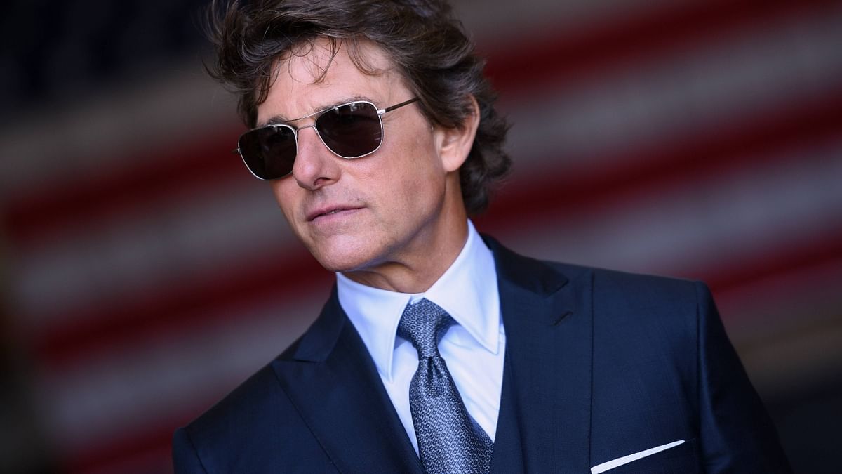 Tom Cruise looked sharp  in a black suit. Credit: AFP Photo