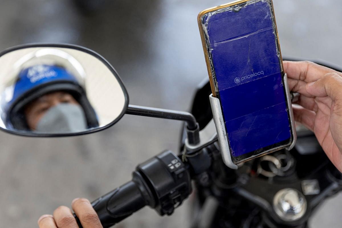 Philippine gas company develops app to allow motorists to store petrol for future use. Credit: Reuters Photo