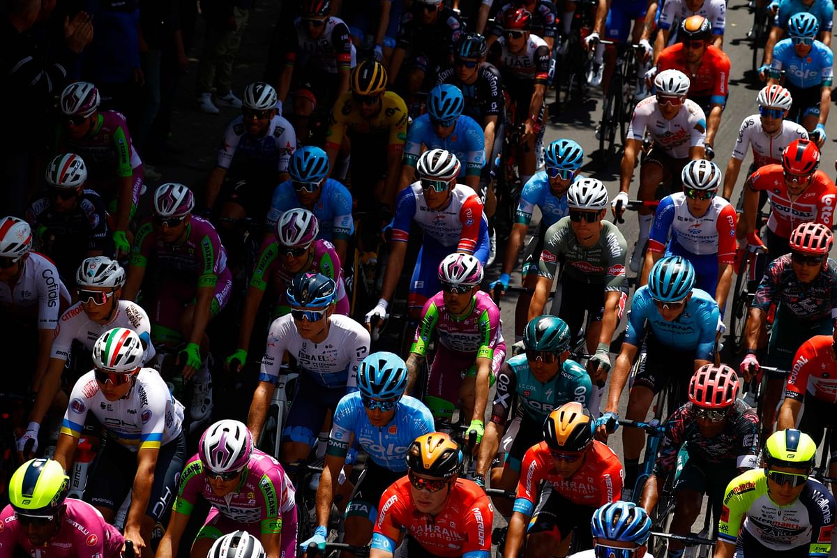 Riders take the start of the 4th stage of the Giro d'Italia 2022 cycling race, 172 kilometers between Avola and Etna-Nicolosi, Sicily. Credit: AFP Photo