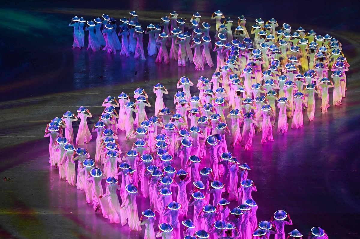 Performers take part in the opening ceremony of the 31st Southeast Asian Games (SEA Games) at the My Dinh National Stadium in Hanoi. Credit: AFP Photo