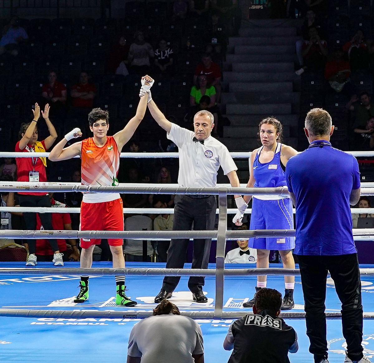 India’s Parveen (in red) celebrates after winning her pre-quarterfinals match in the 63kg category event at the 12th IBA Women’s World Boxing Championships, in Istanbul. Credit: PTI Photo