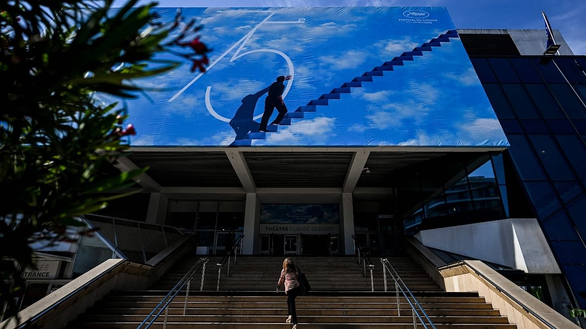 The official poster of the 75th Cannes Film Festival at the Palais des Festivals main entrance in Cannes, France. Credit: AFP Photo