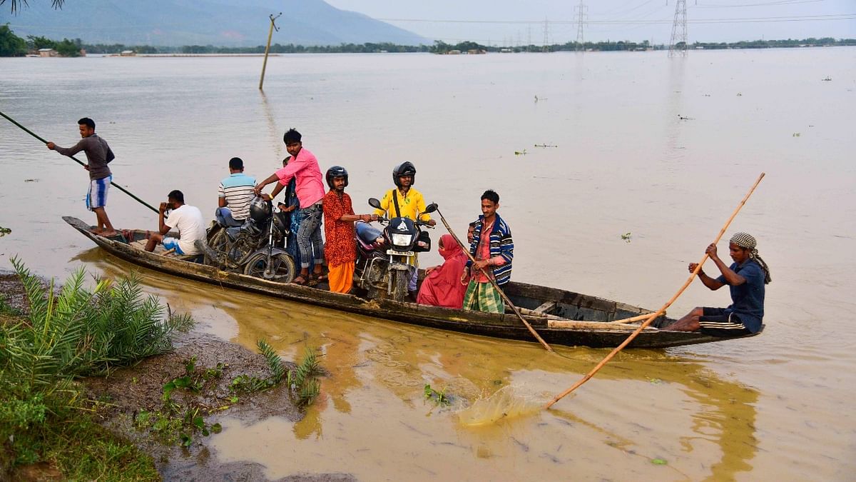 An Assam State Disaster Management Authority (ASDMA) bulletin said the number of affected people has reached 4,03,352 across 26 districts. Credit: PTI Photo