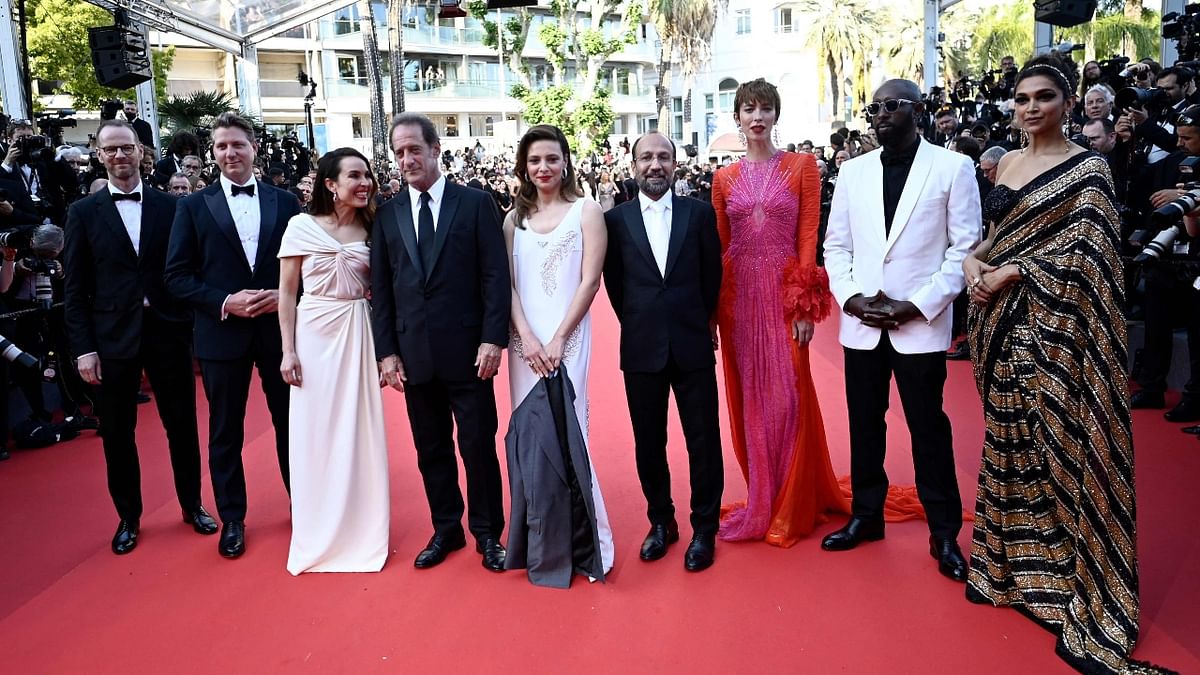 At the red carpet, Padukone posed with fellow jury members French actor Vincent Lindon, English actor-filmmaker Rebecca Hall, Iranian filmmaker Asghar Farhadi, Swedish actor Noomi Rapace, Italian actor-director Jasmine Trinca, French filmmaker-actor Ladj Ly, American filmmaker Jeff Nichols and Norwegian director-screenwriter Joachim Trier from Norway. Credit: AFP Photo