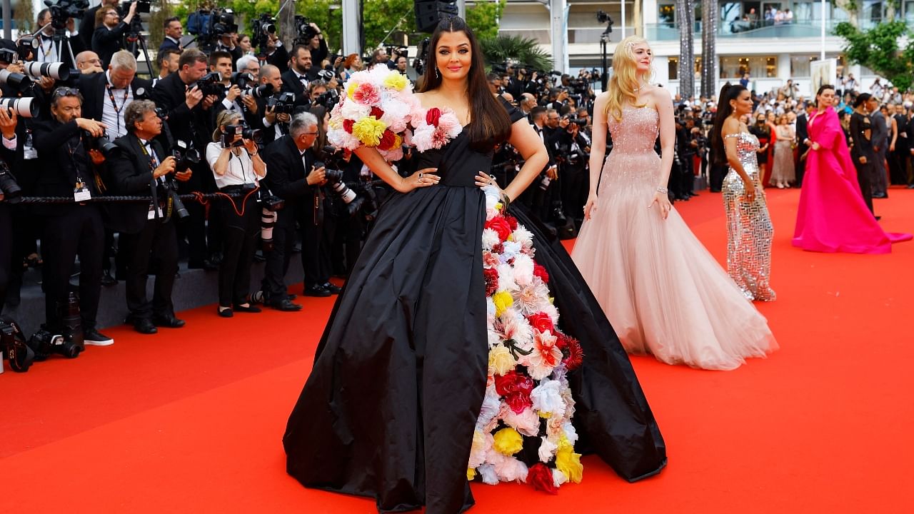 Cannes 2022: Aishwarya Rai Bachchan stuns in pink, Deepika Padukone looks  ravishing in red gown [View Pics]