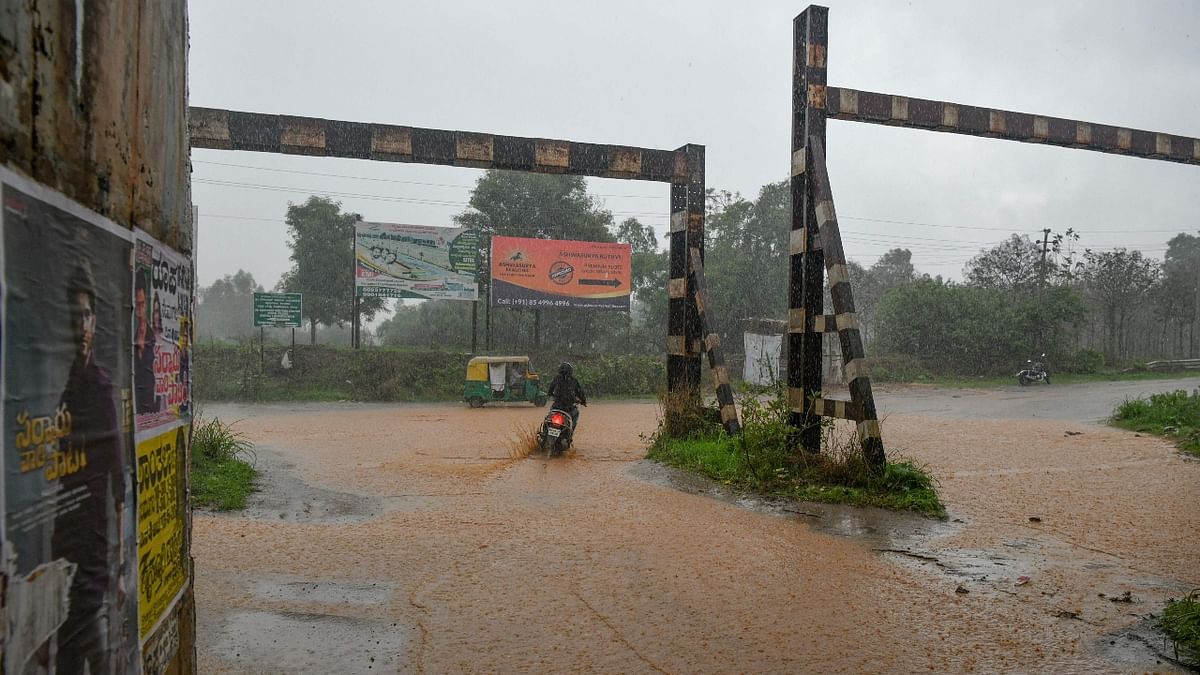 Heavy downpour continued to wreak havoc in various parts of Karnataka, including Bengaluru for the third day, leading to declaration of holiday for schools in some regions. Credit: AFP Photo